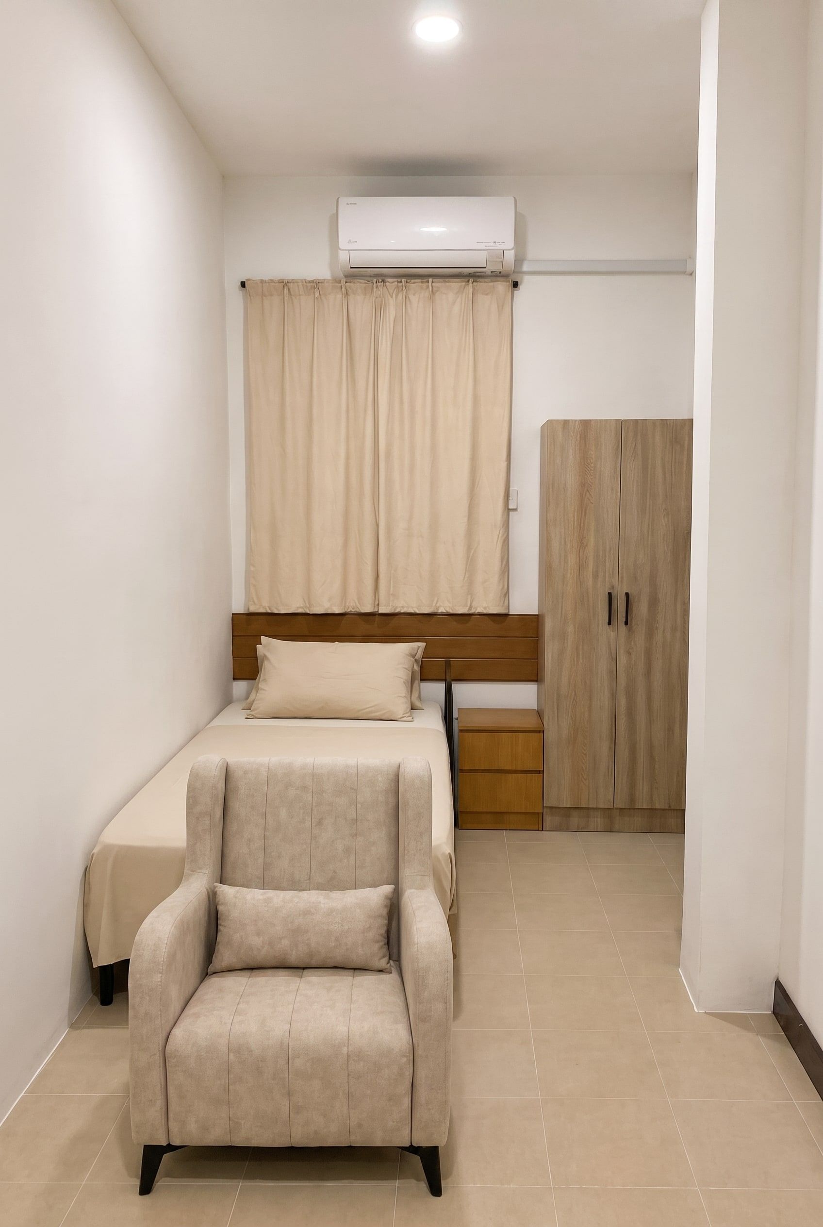 Single Room — renovated private room with bed, armchair and wardrobe