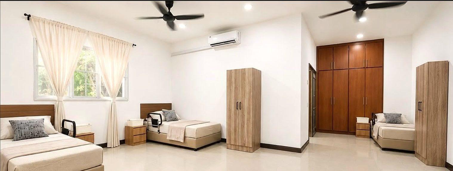 3-Sharing Room — renovated room with three beds, safety grab rails and built-in cupboards